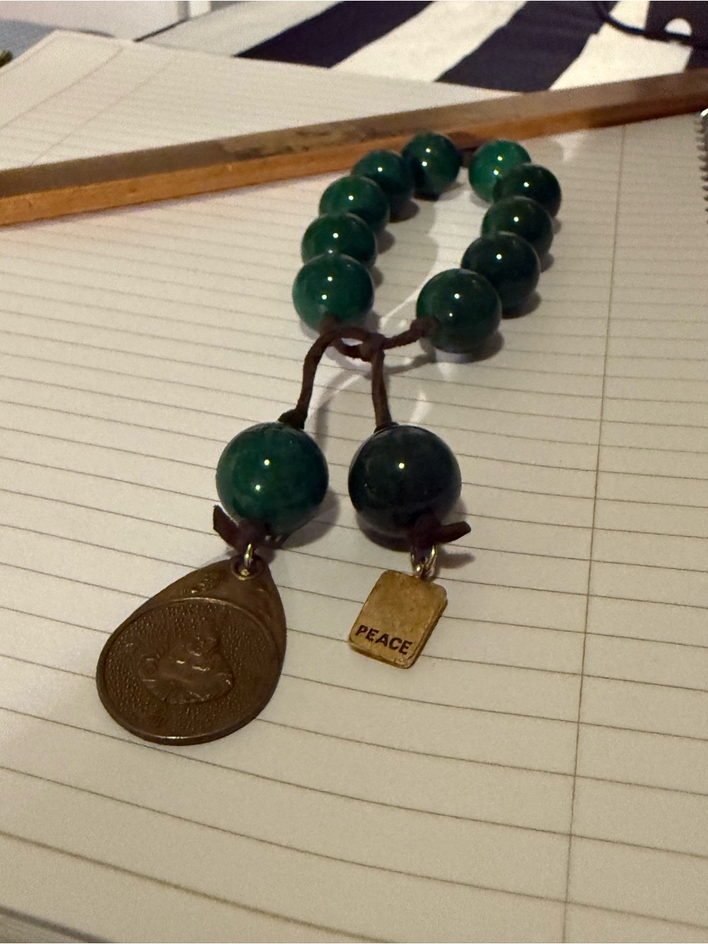 Green Beaded Prayer Bracelet with 'Peace' Charm